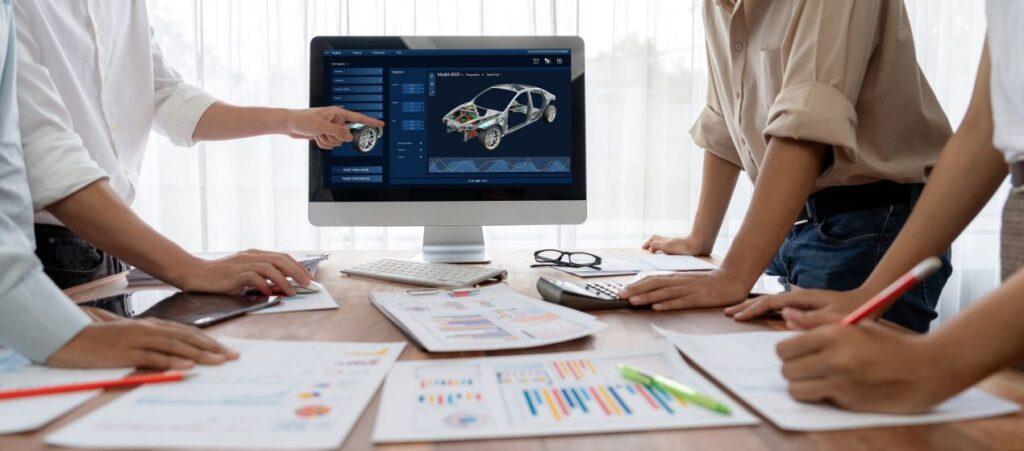 Team analysiert digitales Fahrzeugmodell zur Optimierung der Aeroakustik im Entwicklungsprozess